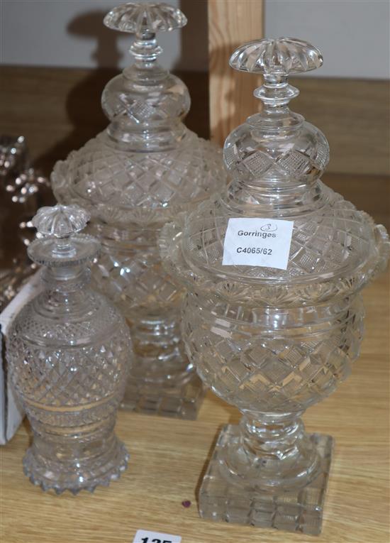 A pair of Regency style glass confitures and covers and a small Regency style decanter (3)